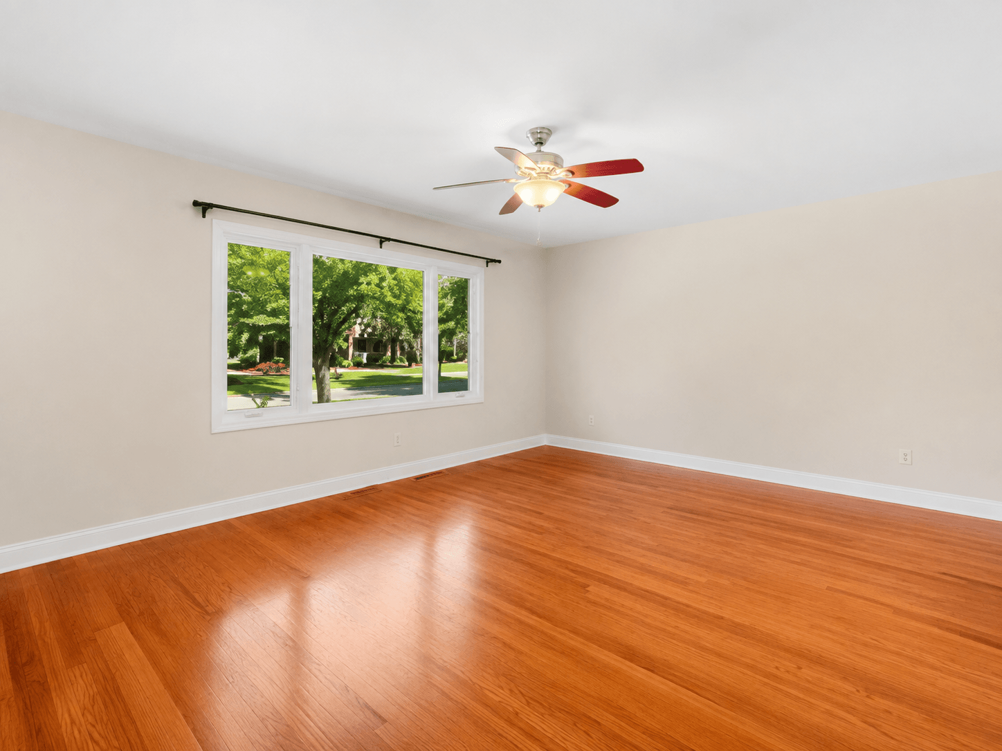 Hardwood living room before Flourish transformation